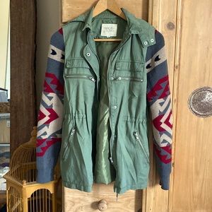 Thread and Supply military jacket with sweater sleeves.